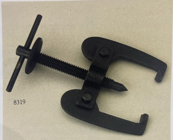 Battery terminal puller tool removing corroded battery clamp